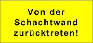 Schild: Von der Schachtwand zurücktreten !